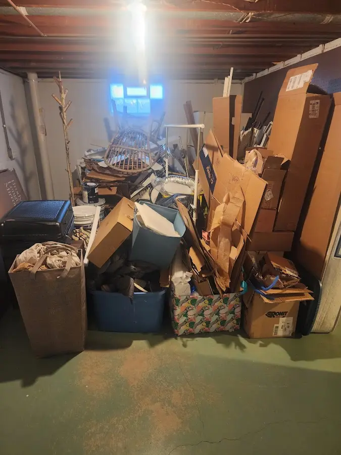 Roll-off dumpster container at job site for Construction Dumpster Rental in Muskegon